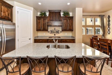 Kitchen Island - The Kitchen Island comfortably seats 4 adults and creates a great space for serving and preparing meals.