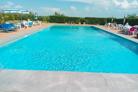 Water, Property, Cloud, Swimming Pool, Sky, Blue, Azure, Plant, Rectangle, Tree
