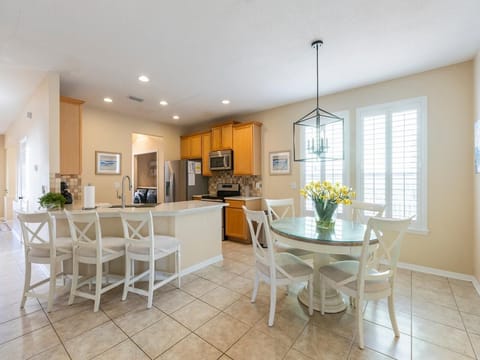 Bright, airy kitchen and breakfast room with pool view!