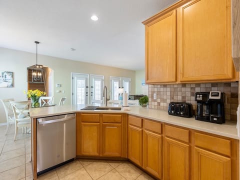 Bright, open kitchen with modern appliances and breakfast nook