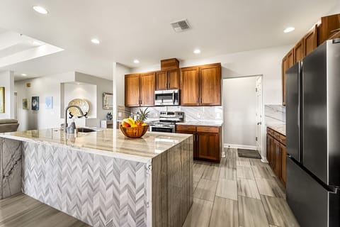 Kitchen Island with Prep Sink, Microwave, and Refrigerator