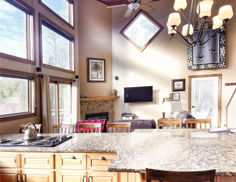Patio doors lead to a large deck just off the living room.
