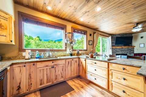 View of Whiteface Mountain is yours from the modern kitchen