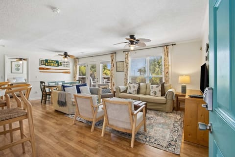 Entryway view of Living Room and Dining Area