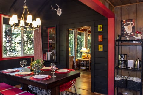 The dining room is at the juncture of the kitchen and living room.