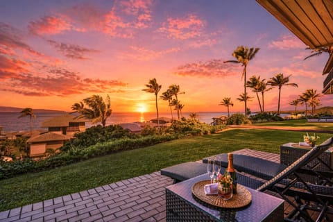 Peaceful lanai moments overlooking green lawns, gorgeous sunsets, and blue water