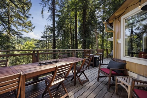 Welcome to The Grove - where the upper level deck includes several seating areas - some covered to enjoy rain or shine.