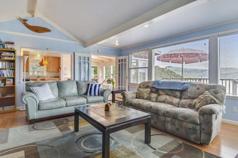 Get cozy in the living room - windows all around.