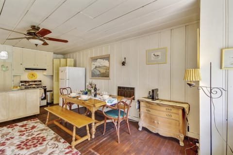 Comfortable dining for 4 open to the kitchen.