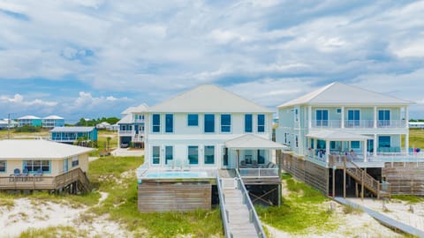 Featuring a private heated pool and boardwalk directly to the sand