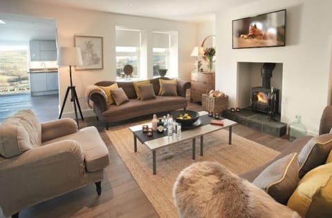 Ground floor: Cosy sitting room with wood burning stove