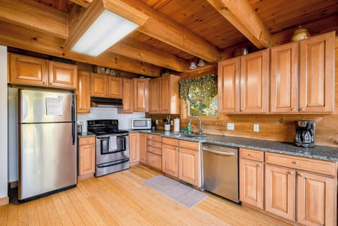 Fully stocked kitchen with stainless steel appliances