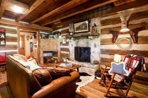 Warm and inviting country-inspired living room greets you