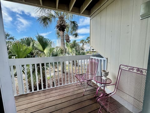 Sip your morning coffee on your private balcony, surrounded by swaying palms and tropical beauty under endless blue skies.