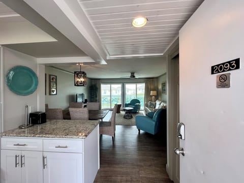 Step into your open-concept suite where coastal colors and natural light create the perfect retreat for relaxation.