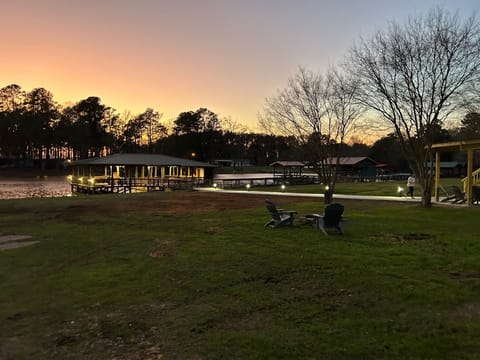 Large yard, fire pit, huge boathouse, and stunning sunsets