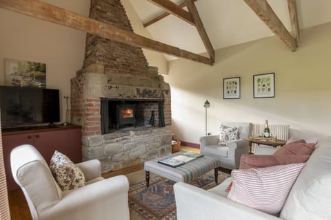 The Smithy, Crookham - relax in front of the cosy wood burner after a busy day exploring the local area