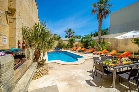 Pool area of Ponderosa farmhouse in Gozo
