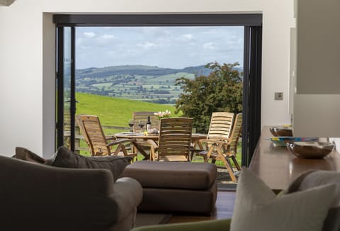 View onto the garden with gravel outdoor seating area