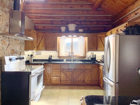 Beautiful kitchen with new refrigerator, dishwasher, and Keurig Coffee Maker