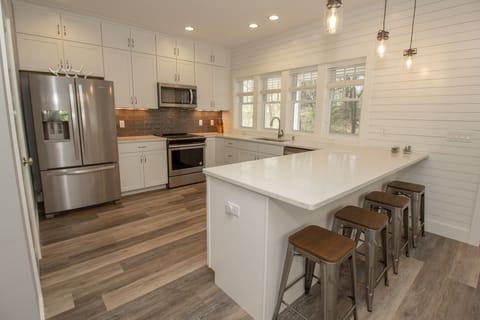 Main Level | Kitchen - Fully Stocked KItchen with all your cooking needs.