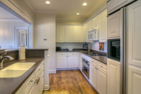 Full kitchen is spacious enough for 2-3 people