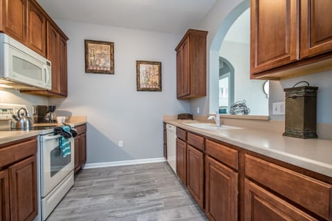 Bright and Airy Culinary Haven: Revel in the natural light that floods our kitchen, creating a bright and airy space for your cooking endeavors