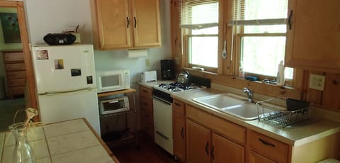 Compact but fully-stocked kitchen except for dishwasher...