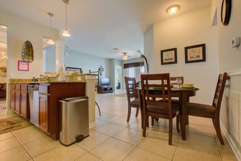 Savor the essence of home in this inviting dining and kitchen space – where culinary delights and shared meals become the heart of every gathering. Embrace the warmth of togetherness amidst stylish design and modern convenience.