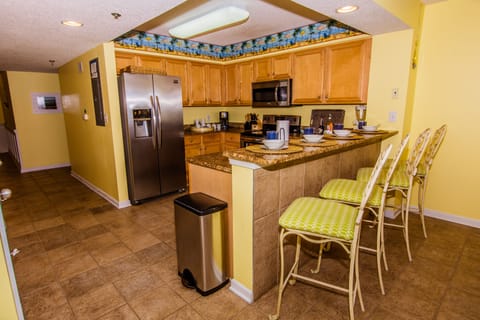 Updated kitchen with all of the extras, as well as breakfast bar seating for 4.