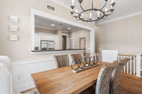 Enjoy dining under chandelier lighting