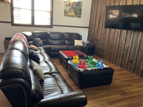 A huge/spacious room to relax in includes a loft with a large-screen TV.