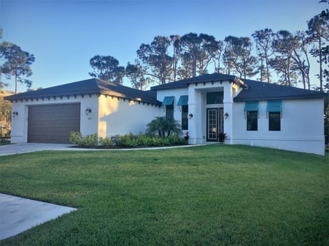 Front of house.  Enjoy the oversized two car garage.