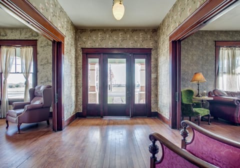 Waltz into the foyer and choose which pocket doors you want to mosey into first.