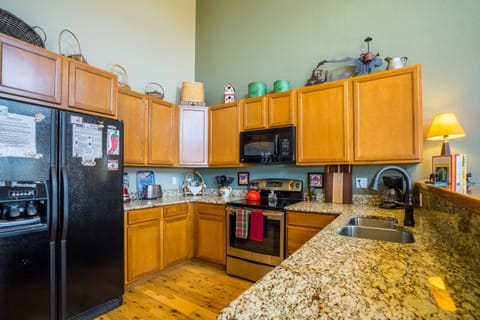 Sizable, well-stocked kitchen to meet all your culinary needs.