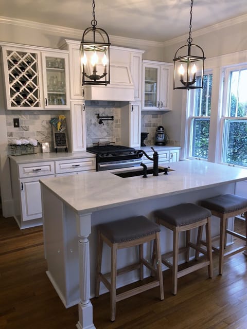 Enjoy a gourmet kitchen complete with a kichen aid mixer & pot filler over the gas stove.