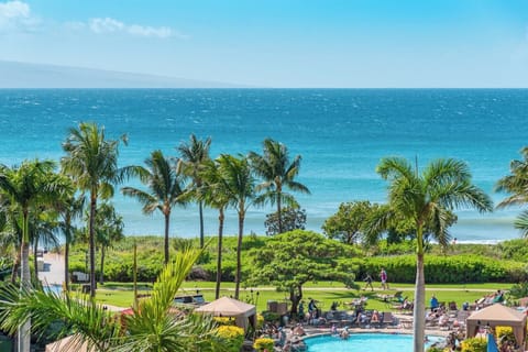 Enoy aqua marine views and cool shade breezes by the pool