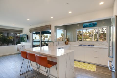 Dining seating for 9 with room on the deck for more.