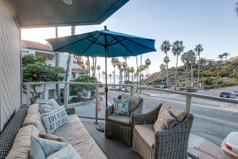 Drink your morning coffee on the deck while watching local surfers.