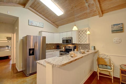 Kitchen - Experience culinary charm in this cozy kitchen, where efficiency meets elegance