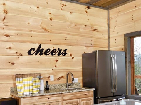 A cold beverage is always nearby in the game room`s wet bar & full size fridge