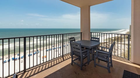 Enjoy meals or drinks at the outdoor table while taking in the sweeping views of the coastline and waves