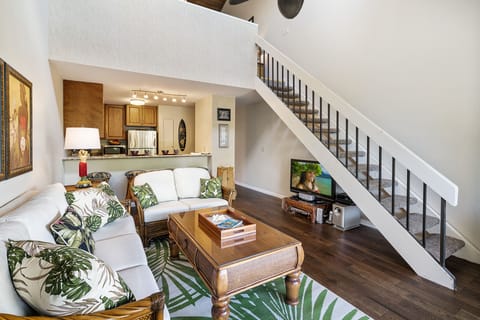 Kitchen and staircase leading to upper floor loft bedroom  and en-suite bath