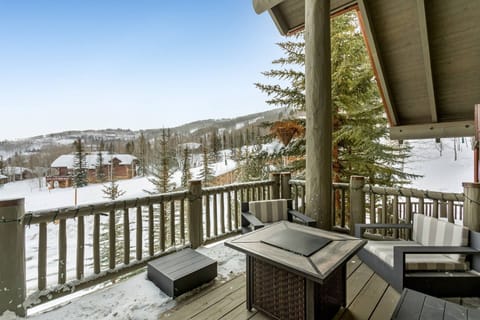 Enjoy Mountain Views around the exterior fire pit.