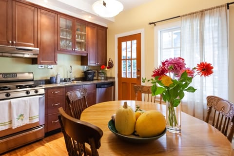 quaint full kitchen with a cupboard of complete spices for the travelling cook.