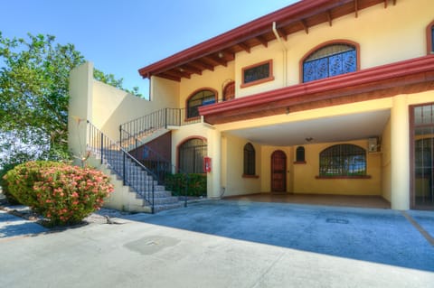 Front of condo with garage