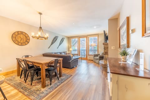 Settle into your spacious open-concept retreat where warm wood floors and mountain-inspired decor create the perfect après-ski atmosphere.