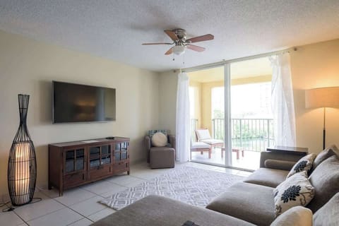 🌿 Unwind in this serene vacation rental with comfy seating, natural light & private balcony views!