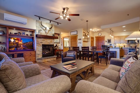 Cozy up in this inviting living space where rustic charm meets modern comfort, perfect for relaxing after your mountain adventures.