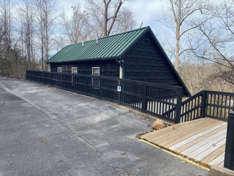 Front of house and parking area.